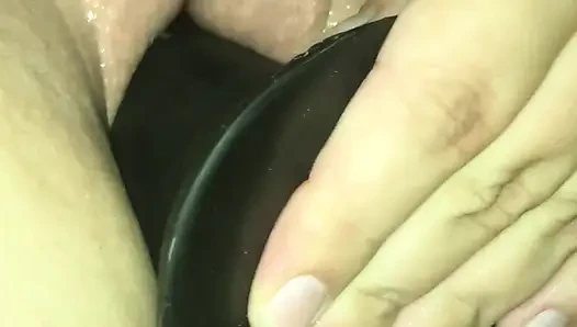 Playing with big dildo