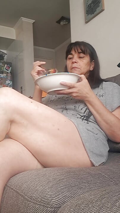 MILF Spreading Her Legs While Eating