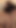 Stunning moment from "Sensual podcast story two lesbian bodies coming together on a small bed in a room with dimmed lights"