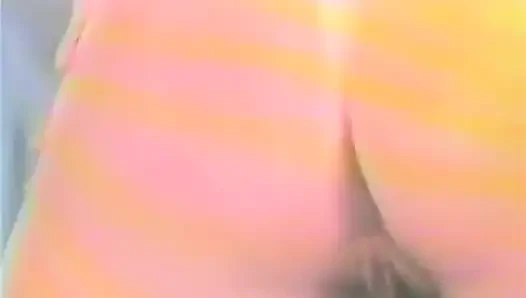 Older brunette fucks both her holes with dildos