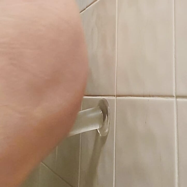 Riding a dildo