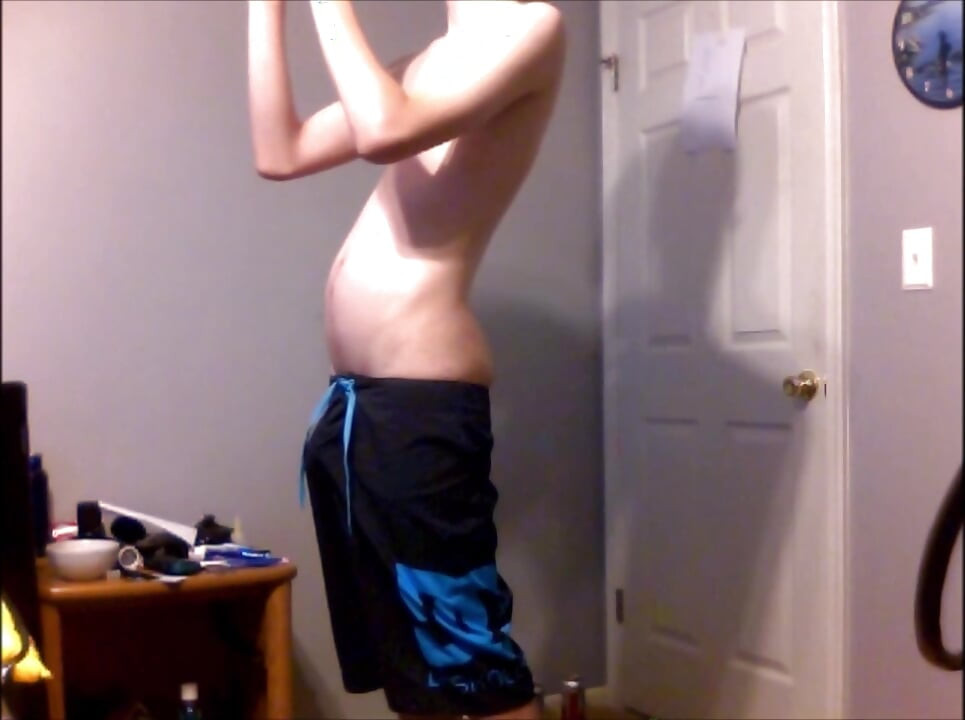 Young Guy Fills His Stomach with Water
