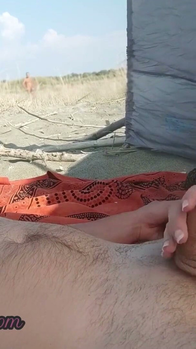 My wife jerks my dick in front of a stranger in nudist beach | Clip 1