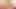 Busty brunette ladyboy in black panties masturbates on the