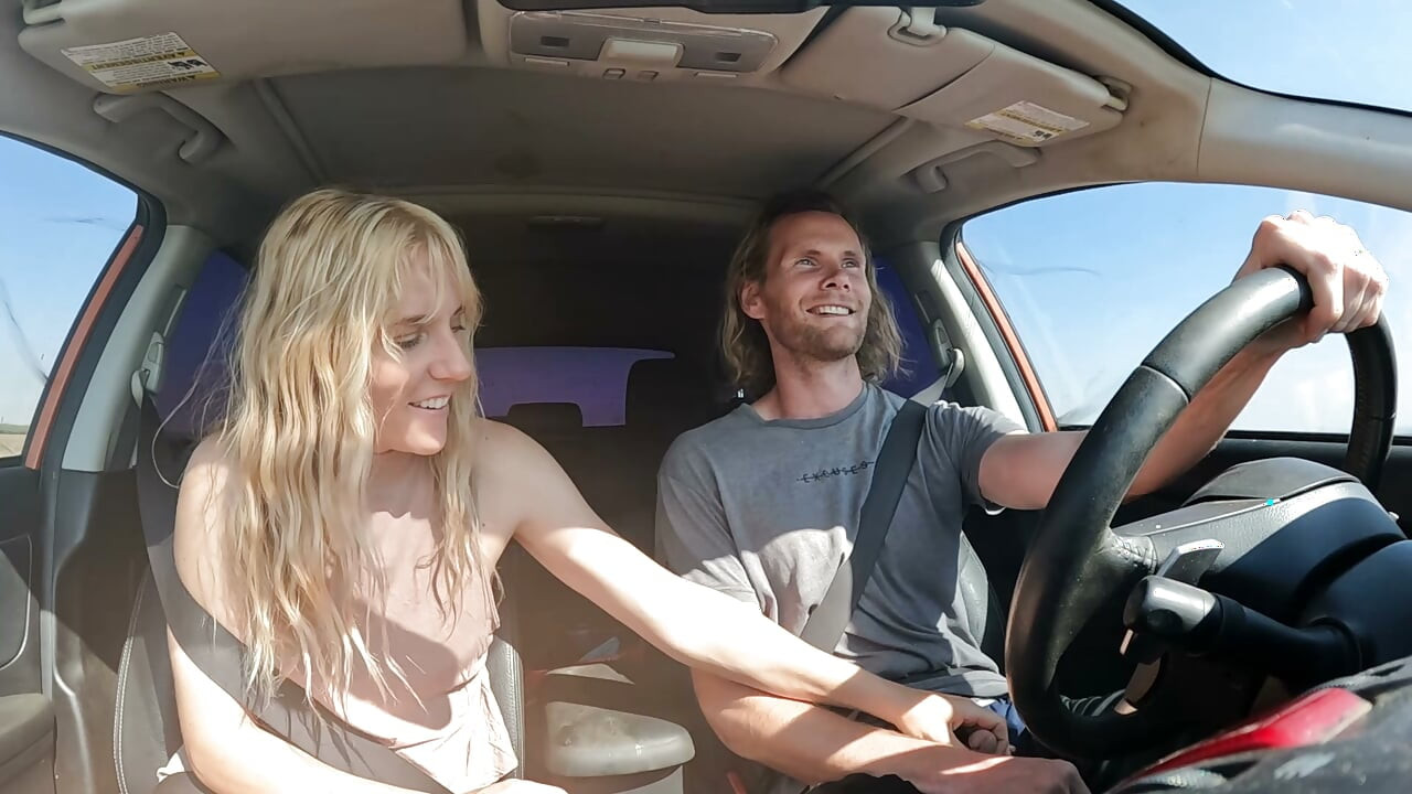 Petite Blonde Gives Her Man Road Head In The Car