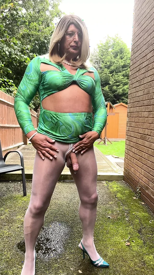Amateur crossdresser Kellycd2022 sexy milf peeing in her little white panties and masturbating outdoors in white pantyhose