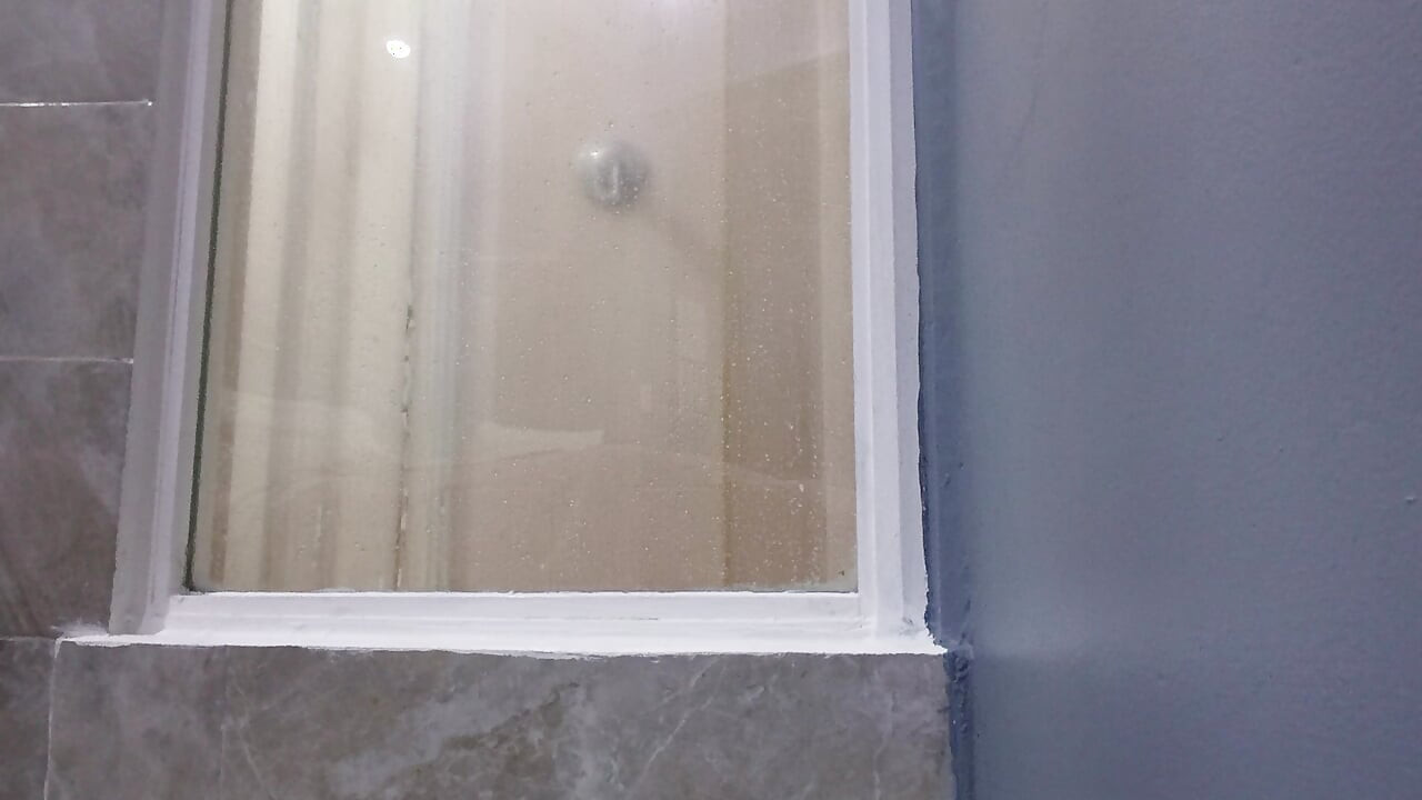 I take a nice bath at the hotel while I wait to relax.