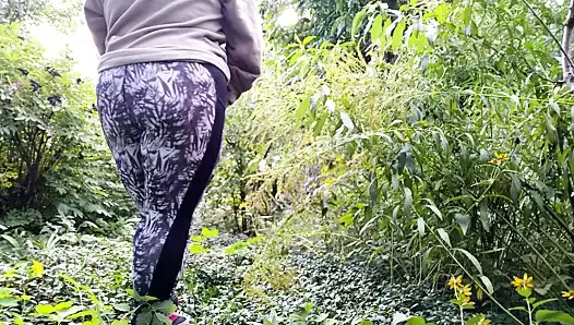 Huge ass fat MILF in leggings pissing doggystyle outdoors