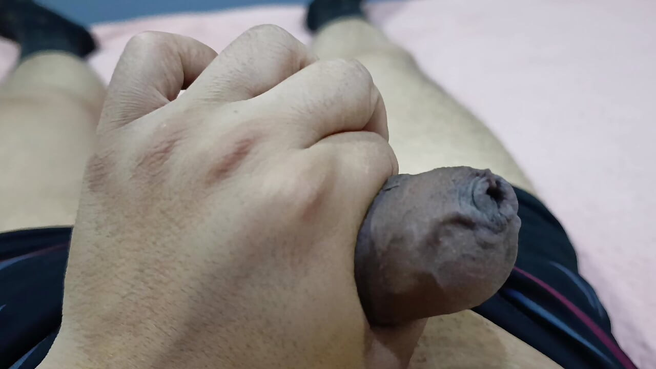 I massage my big cock on the hotel bed at night to really relax.