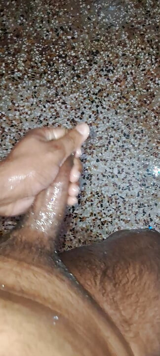 A Young Hindu Boy From India Is Fucking His Thick Cock Hard with His Hands While Taking a Bath