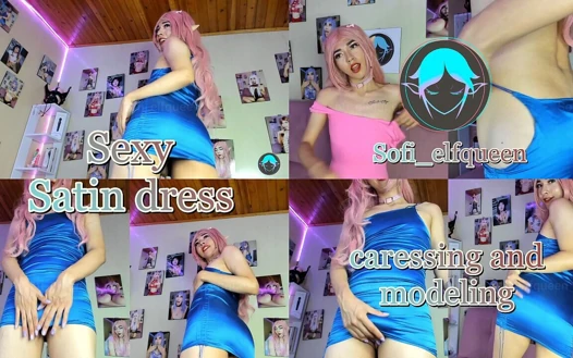Saten elbiseyi değiştiriyor ve modellik yapıyor