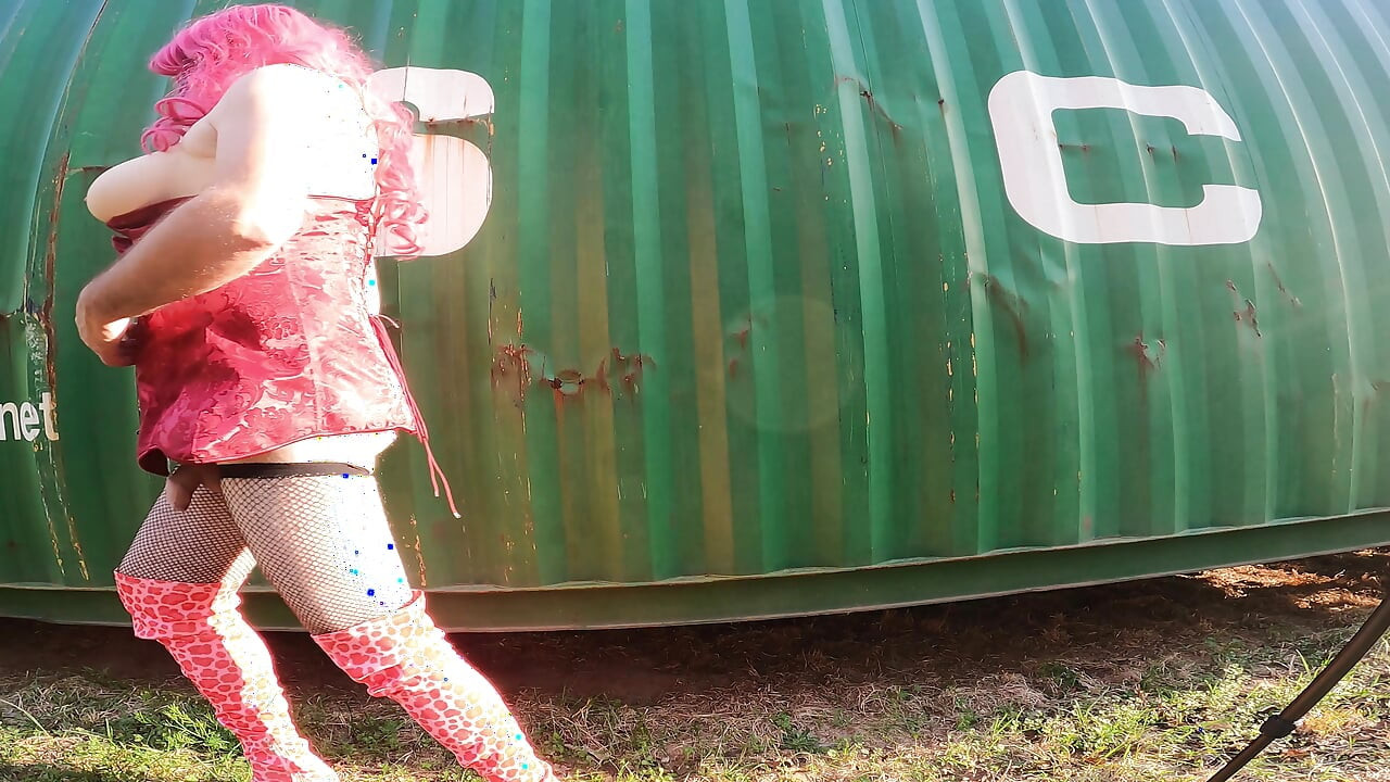Big soft fake tits crossdresser having jacking off by a shipping container