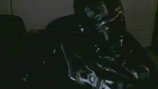 Rubber gimp in the dark