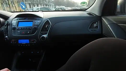 Elegant mature woman takes a taxi in the morning to go to the office.