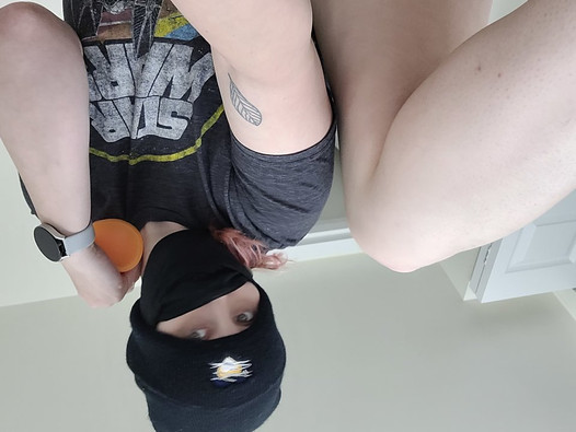 Pawg in Star Wars shirt plays with orange dildo