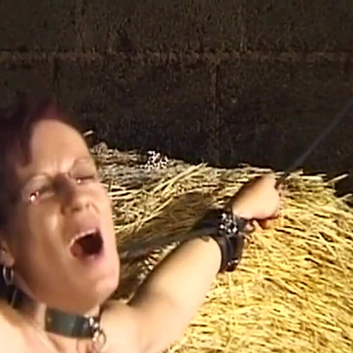 Mature Redhead MILF Bound in Leather for Teasing