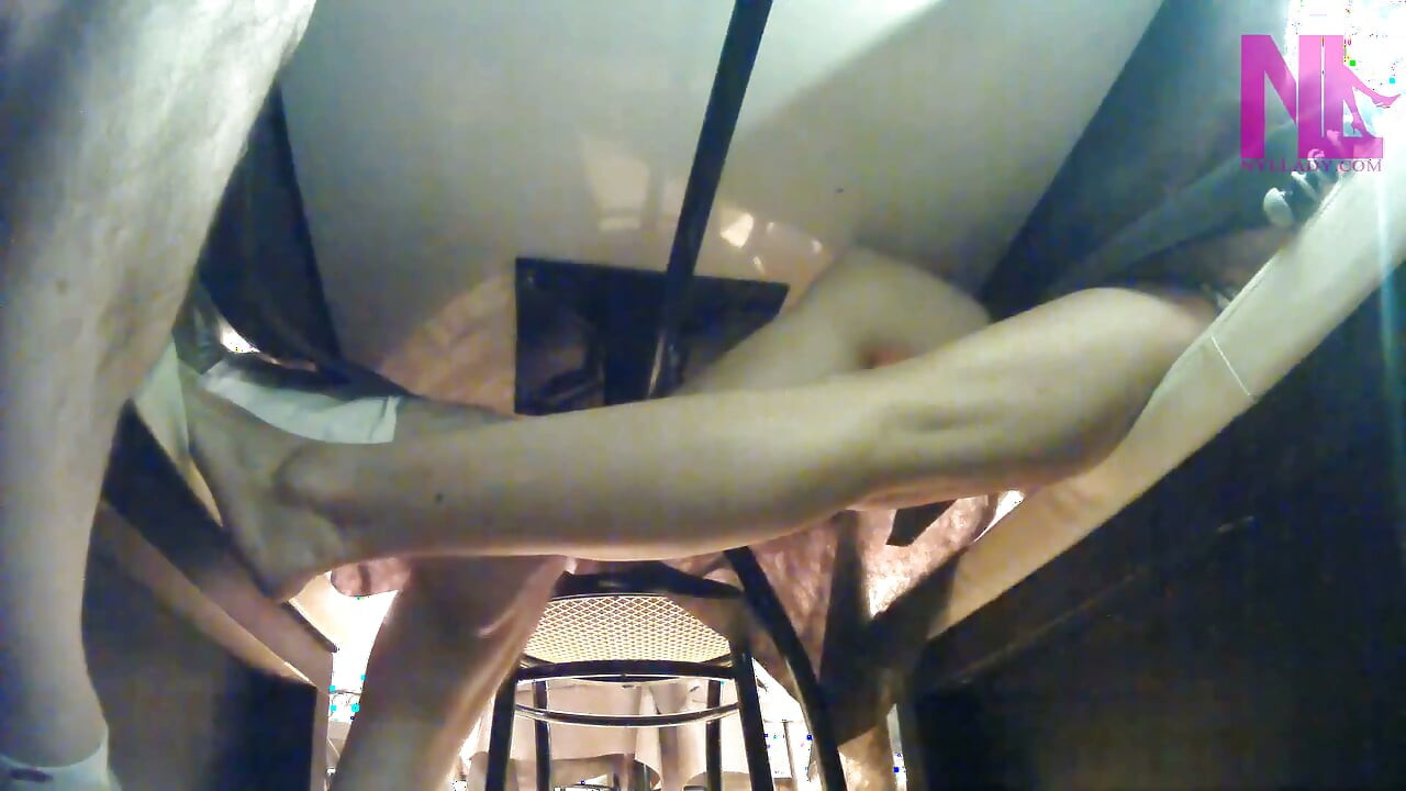 Sensual Barefoot Footsie in Restaurant