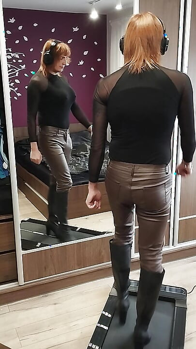 Learning to walk in heels in leather pants