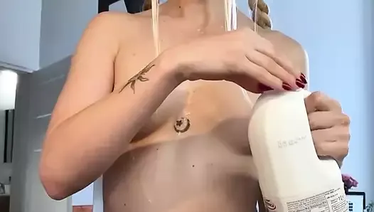 Cute Kitty Drinks Milk from a Bowl Absolutely Naked