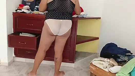 Chubby Girl Tidying the Room and Folding Clothes