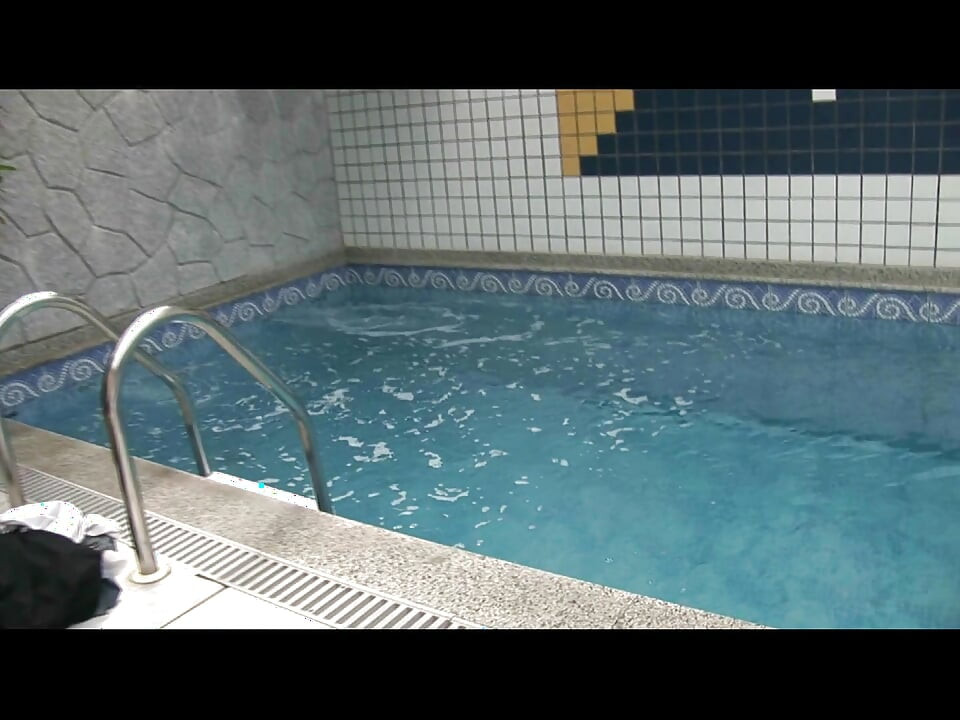 Gay sex next to swimming pool