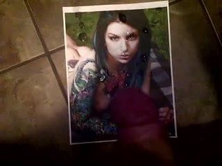 cumming on a pic of a hot tattoo chick