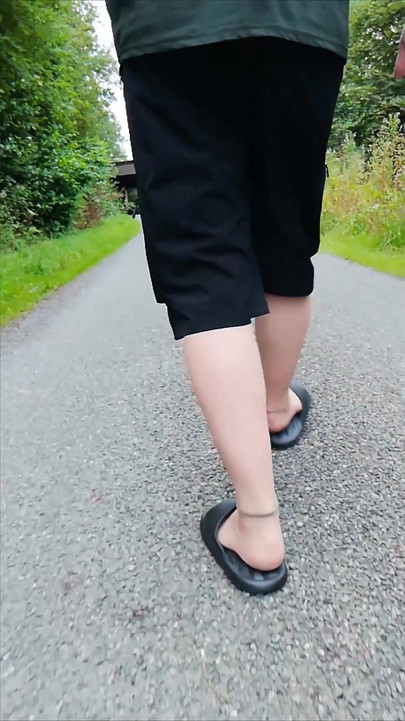 In Slippers and White Socks in Nature