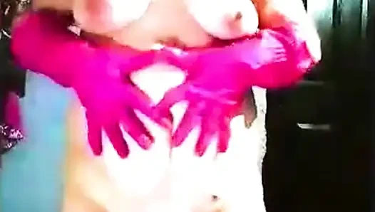 Pink rubber glove pussy fingering