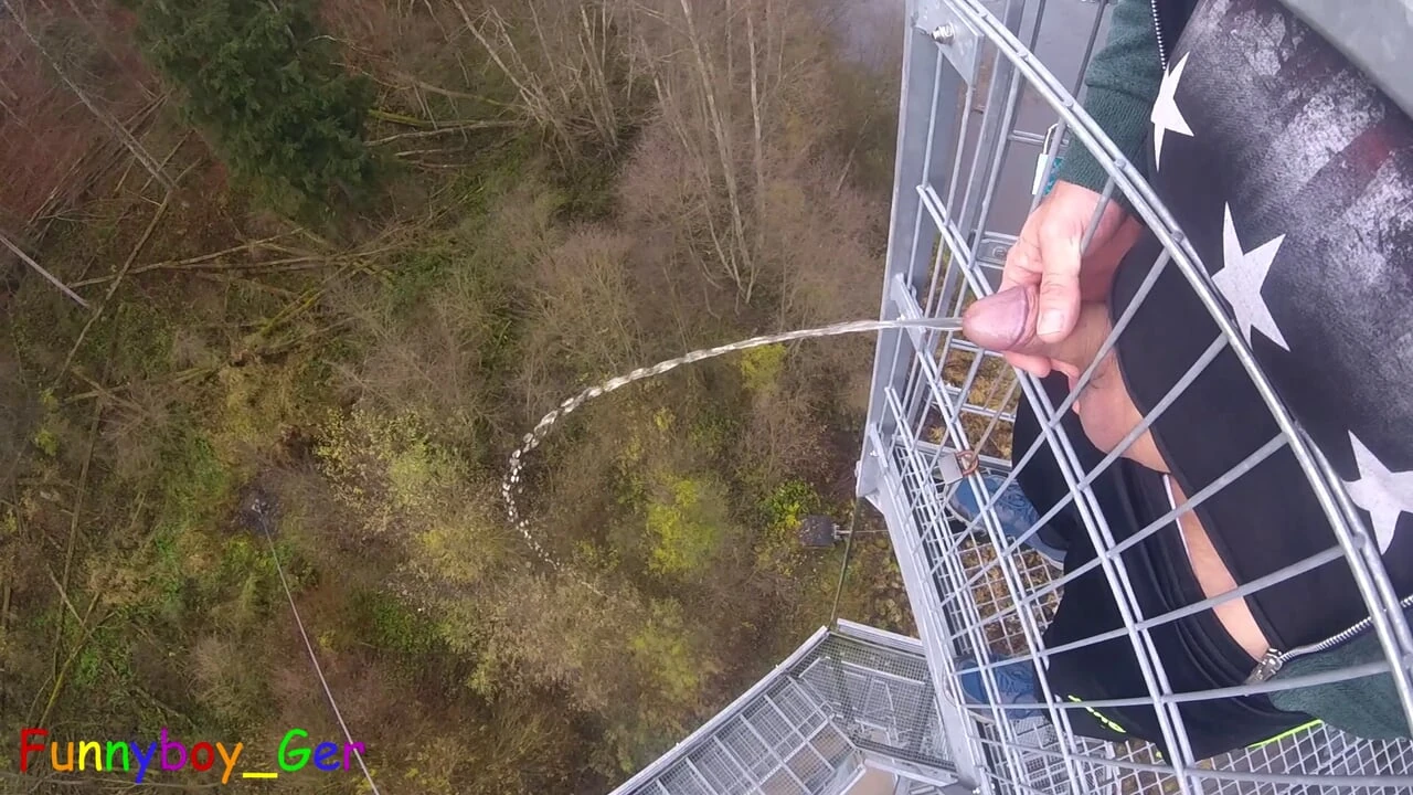 I pee outside from a very public observation tower and then masturbate my penis, and my balls are fat. But then people…