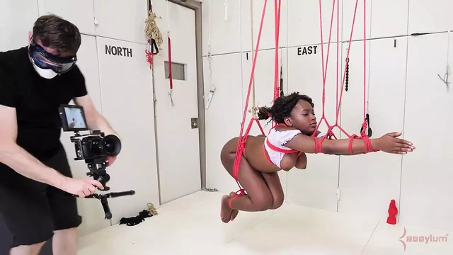 BDSM beauty bound and sucking on dick