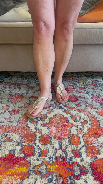 Muscular legs and sandals