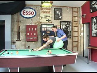 Busty slut rides a solid cock on the pool table