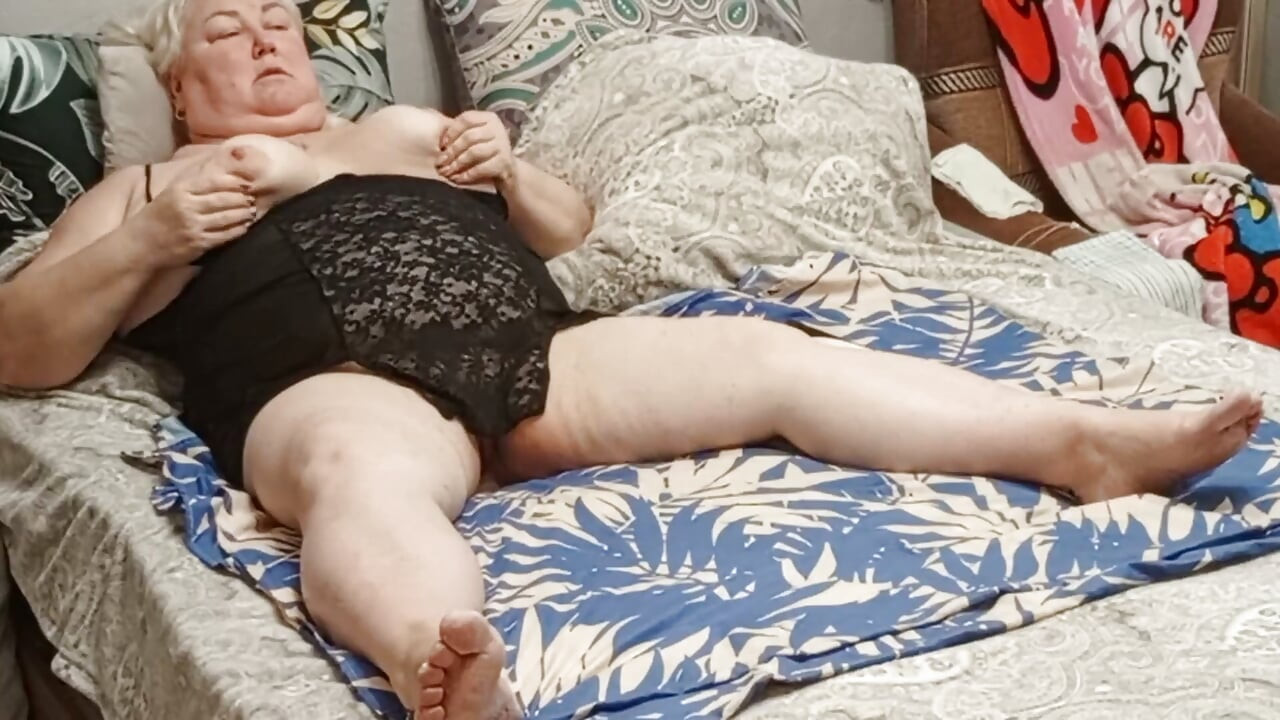 Neighbor Caresses Herself and Masturbates Her Big Pussy