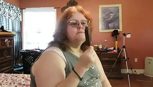 BBW nurse Vicki enjoys eatting a chocolate vanilla ice cream popsiscle