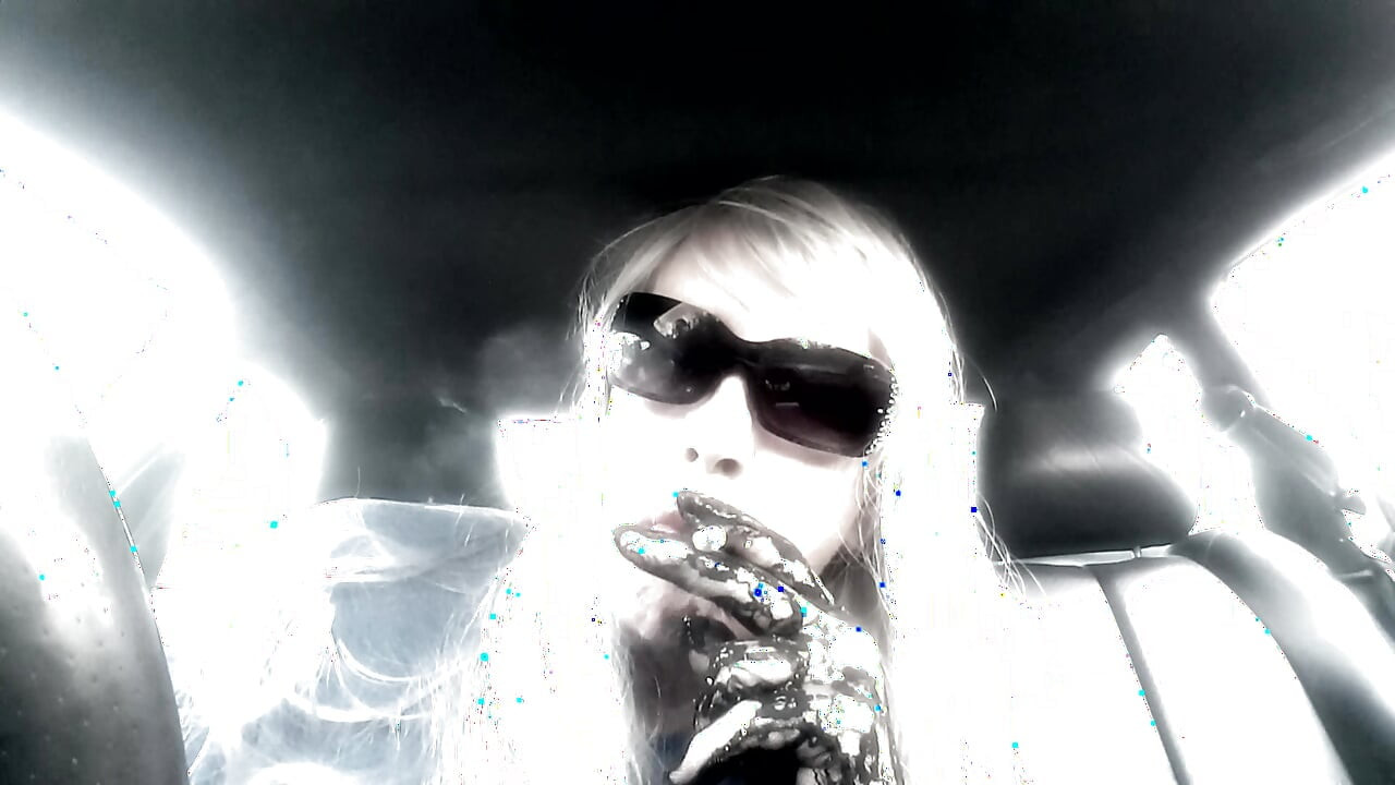 Mrs. Ruthie Dommie Mommy smoking Marlboro 100s in her car