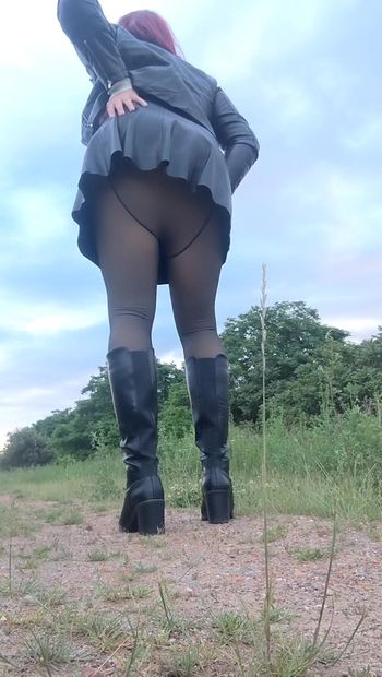 Horny sissy slut in leather outfit enfemme in the woods