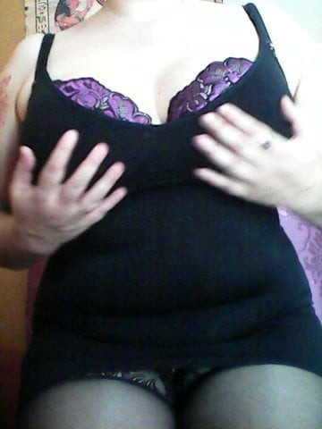 My wife is caressing herself