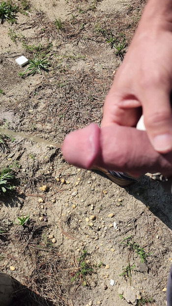 Iconic moment from "Hot hard thick ringed clamped mushroom tipped cock throbbing outdoor pissing"