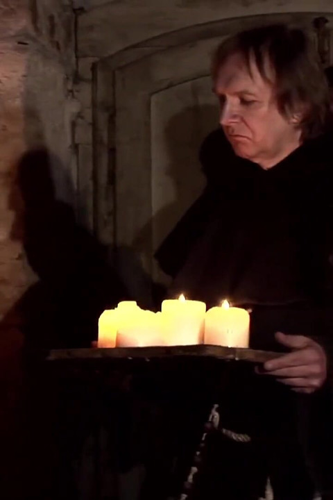 A Witch Is Dangling Over Small Flames