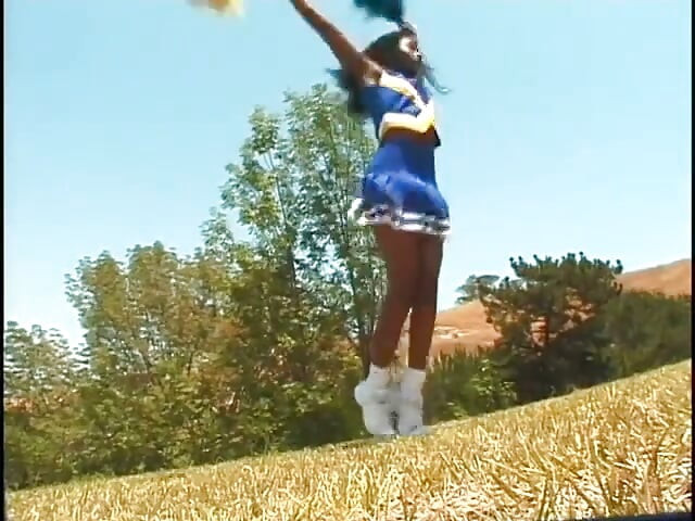 Black cheerleader with perky tits rides a big black cock