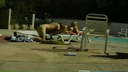 Facial cumshot for a hot blonde babe by the pool