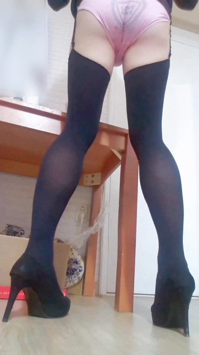Unforgettable moment from "Young asian sissy in black garterbelt stockings and highheels gives herself an enema and shaves"