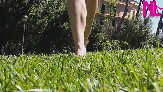 Nyllady Walking Barefoot on Th Grass in a Park