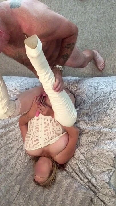 LINDA in  white boots