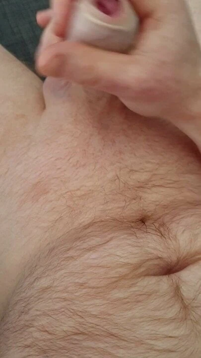 Masturbating