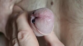 Masturbating the still half-numb cock until it squirts
