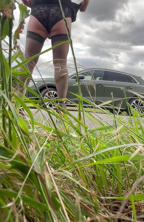 Crossdresser  husband out for a drive, walk and wanking in heel and stockings.