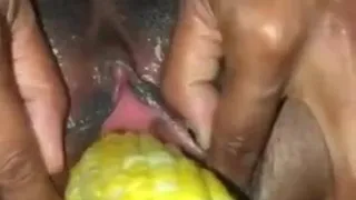 ebony girl gets her pussy stretch with corn