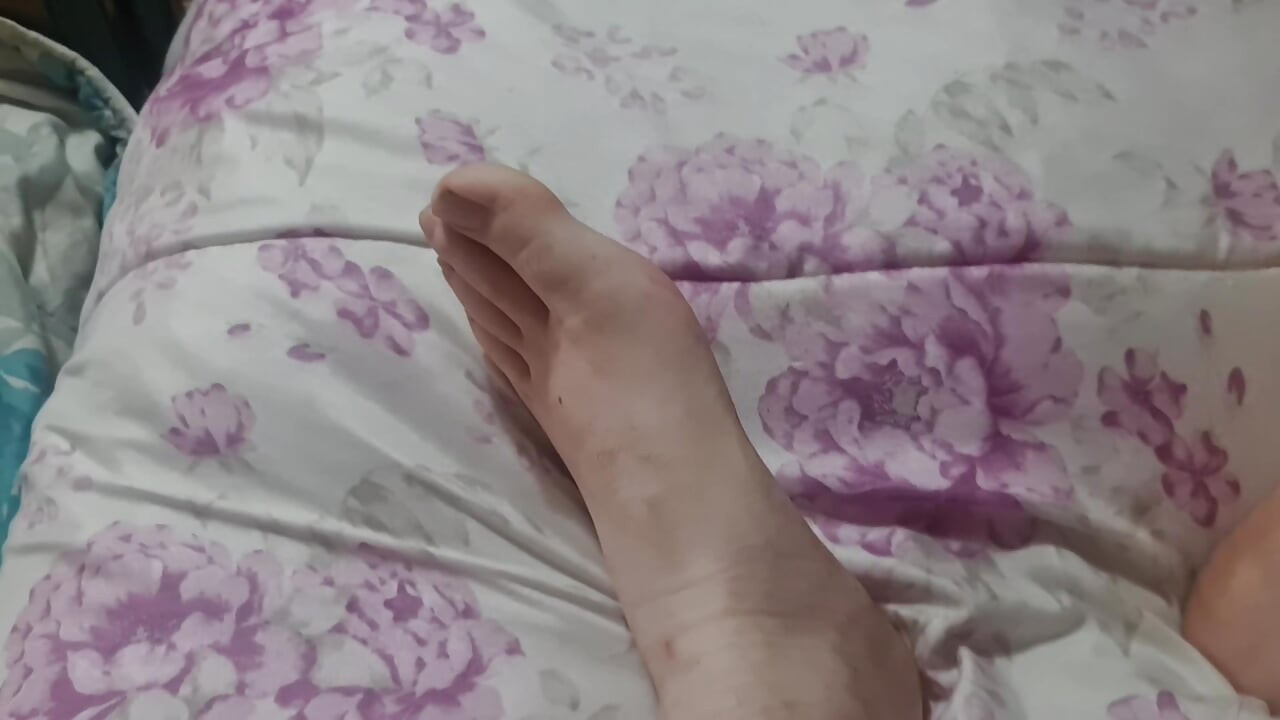 My feet in bed
