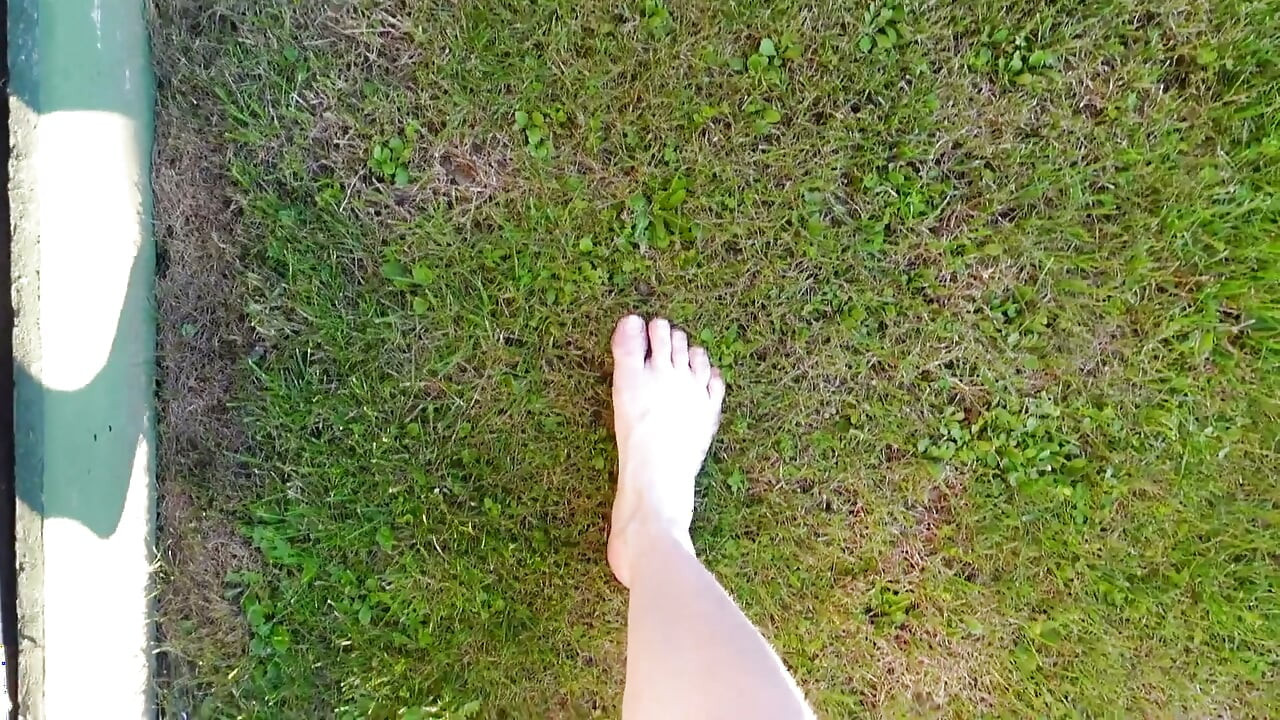 Walking with My Feet on the Grass and Showing Them to You up Close